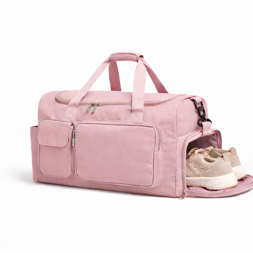 Sac de sport rose pâle avec ouverture latérale pour chaussures de sport.